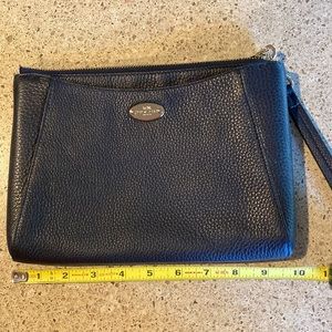 Black leather Coach clutch.